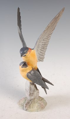 Lot 525 - A Royal Crown Derby bone china model of a Red...