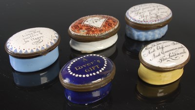 Lot 507 - A collection of five antique enamel patch...