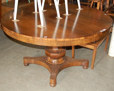 Lot 728 - A 19th century rosewood snap-top supper table...