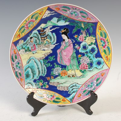 Lot 534 - A Japanese blue ground porcelain charger,...