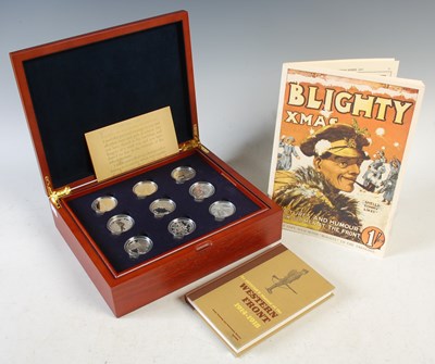 Lot 539 - A cased set of eighteen Royal Mint silver...