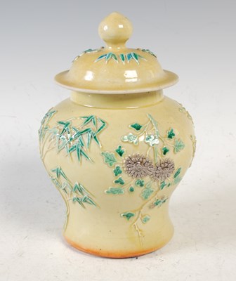 Lot 592 - A Chinese porcelain yellow ground jar and...