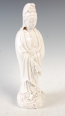 Lot 596 - A Chinese porcelain blanc-de-chine figure of...