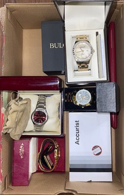 Lot 573 - A box of assorted wristwatches, makes to...