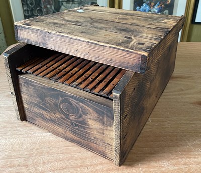 Lot 681 - A Japanese stained pine rectangular mechanical...