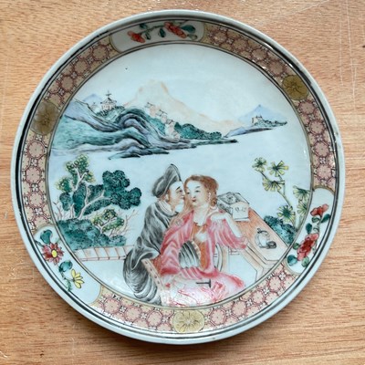 Lot 687 - A Chinese porcelain famille rose saucer, Qing...