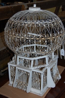 Lot 693 - A vintage off-white painted birdcage in the...