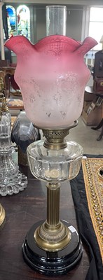Lot 637 - A 19th century paraffin burning oil lamp, with...