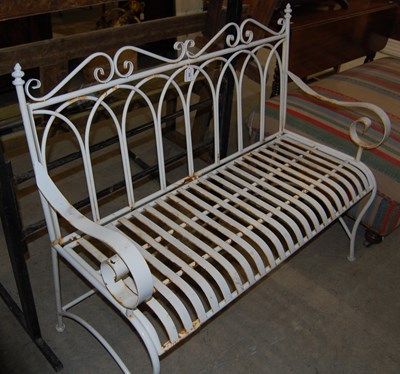 Lot 695 - A reproduction Gothic style white painted...