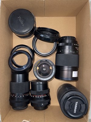 Lot 654 - A box of assorted camera lenses, to include...
