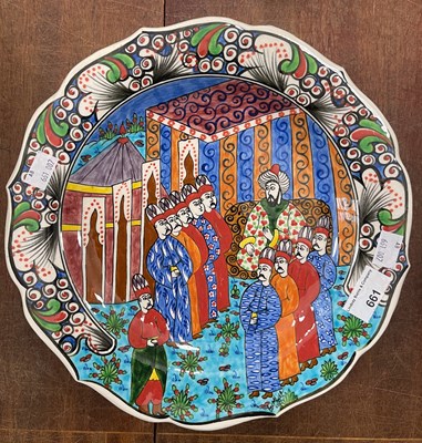 Lot 661 - A Kutahya hand painted pottery dish, reverse...