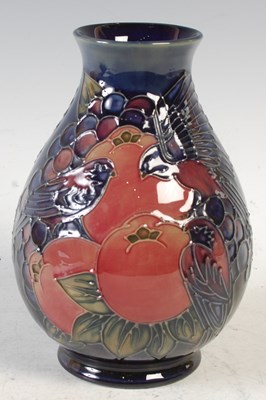 Lot 602A - A Moorcroft finch and berry pattern vase,...
