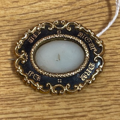 Lot 454C - A 19th century yellow metal and black enamel...