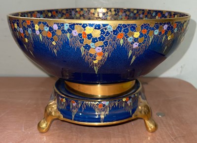 Lot 701A - A Carlton Ware blue ground pottery bowl in...