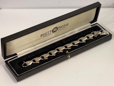 Lot 291B - Brett Payne, a silver and 9ct gold fish...