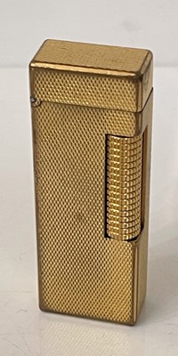 Lot 291C - A vintage Dunhill gold plated gas lighter, 6.5cm.