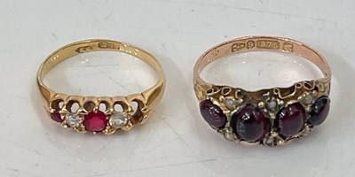 Lot 291K - A 9ct gold garnet and split pearl dress ring,...