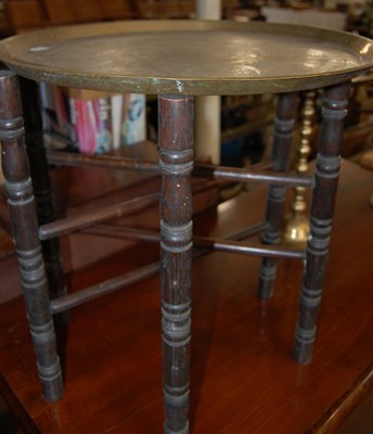 Lot 652 - An early 20th century folding occasional table...