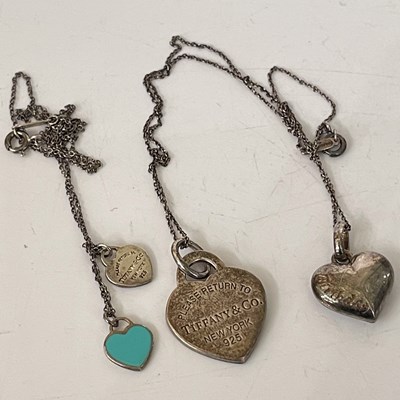 Lot 291N - Two Tiffany & Co. silver pendant necklaces.