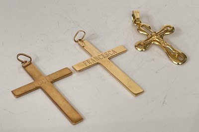 Lot 291O - Three yellow metal cross pendants, all testing...