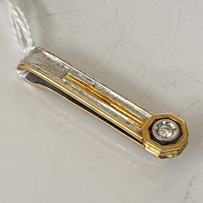 Lot 291P - A yellow and white metal diamond set tie pin/...