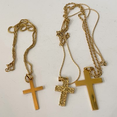 Lot 291 - Three 18ct gold cross pendant necklaces, gross...