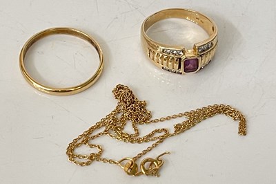 Lot 291U - An 18ct gold and amethyst set dress ring, size...