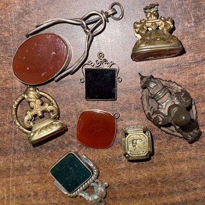 Lot 495I - A collection of seven assorted watch fobs and...