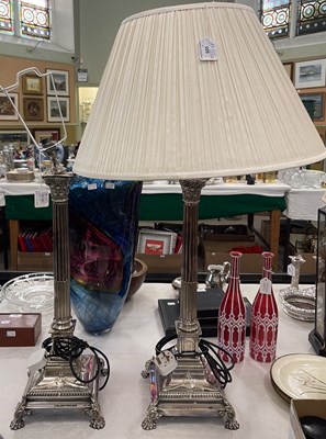 Lot 655 - A pair of electroplated Corinthian column...