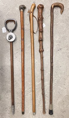 Lot 721 - A vintage shooting stick by W. M. Mills,...