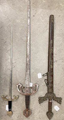 Lot 726 - Three assorted decorative swords, the longest...