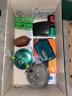 Lot 729 - A box of assorted fishing tackle, to include a...
