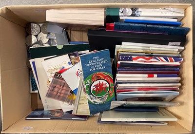Lot 733 - A box of assorted Royal Mint proof coin sets,...