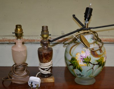 Lot 694 - A 20th century glass table lamp raised on a...