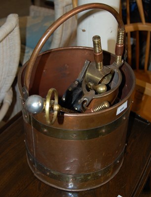 Lot 658 - A riveted copper fuel bin containing assorted...