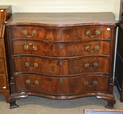 Lot 718 - A George III mahogany serpentine chest, fitted...