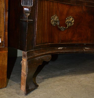 Lot 718 - A George III mahogany serpentine chest, fitted...