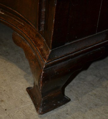 Lot 718 - A George III mahogany serpentine chest, fitted...