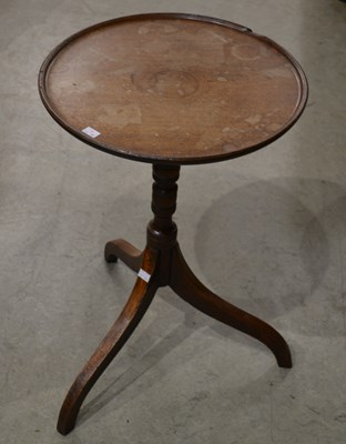 Lot 735 - A 19th century mahogany tripod wine table/...