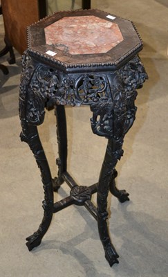 Lot 733 - A 19th century Chinese hard wood plant stand...