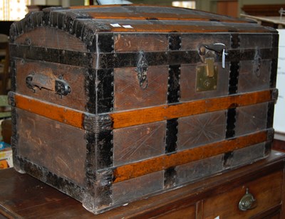 Lot 735 - A vintage wood and metal bound Saratoga dome...
