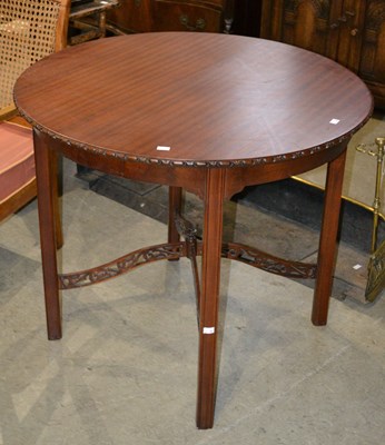 Lot 750 - A 20th century circular mahogany breakfast...