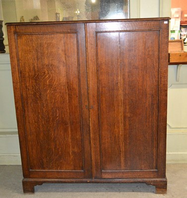 Lot 752 - A 19th century oak linen press/ compactum,...