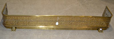 Lot 755 - A 19th century brass fire fender with pierced...