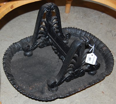 Lot 661 - A cast-iron boot scrape cast with anthemion...