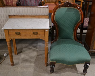 Lot 770 - A late 19th/ early 20th century light oak...