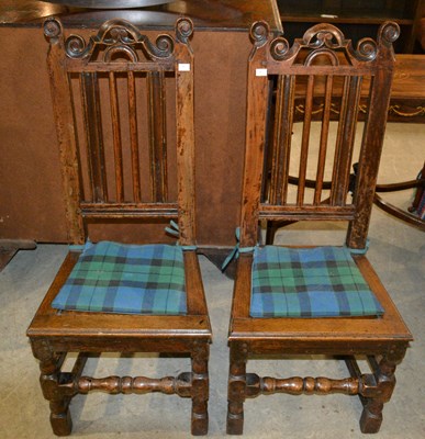 Lot 778 - A pair of 17th century style Jacobean oak hall...
