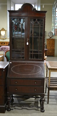Lot 794 - A mahogany secretaire bureau/ bookcase with...