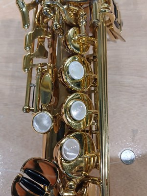 Lot 527 - A brass Yanagisawa Soprano saxophone, engraved...