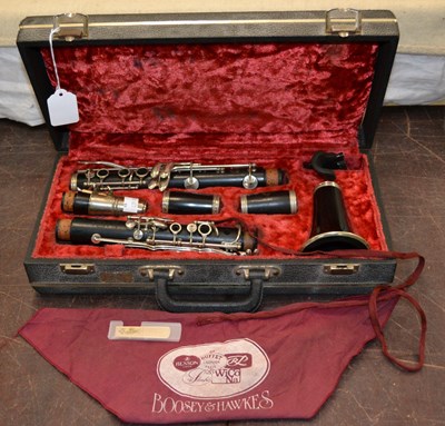 Lot 525 - A Selmer of Paris clarinet in red velvet bound...